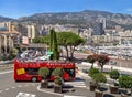 Monaco, France Ã¢â¬â July 24, 2017: Red double-decker bus tour driving on city streets of luxury Monaco (Monte Carlo).